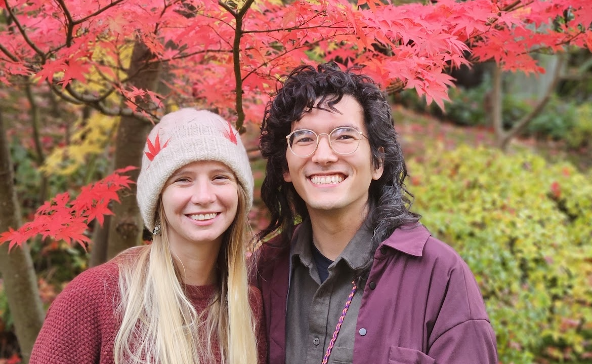 Ken and Fae beside a Japanese maple tree.